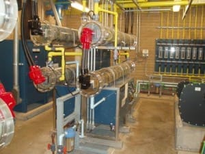 A room full of pipes and pipes in a room, managed by MGC contractors.