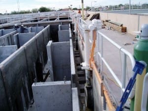A concrete structure with pipes and pipes on it, constructed by MGC Contractors.