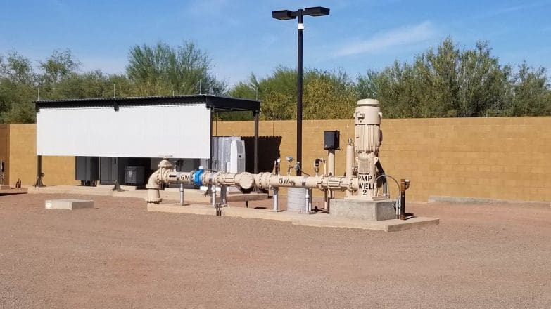 A water treatment plant with a screen in front of it.